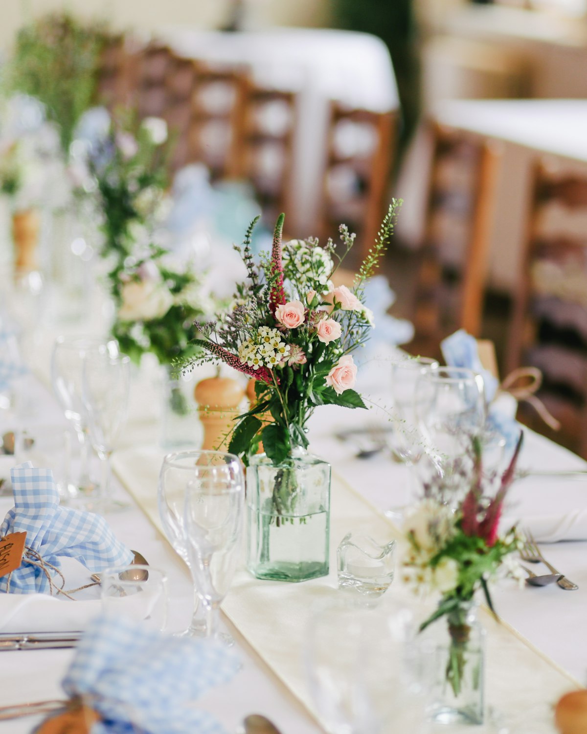Bride in a garden setting at a romantic outdoor ceremony
